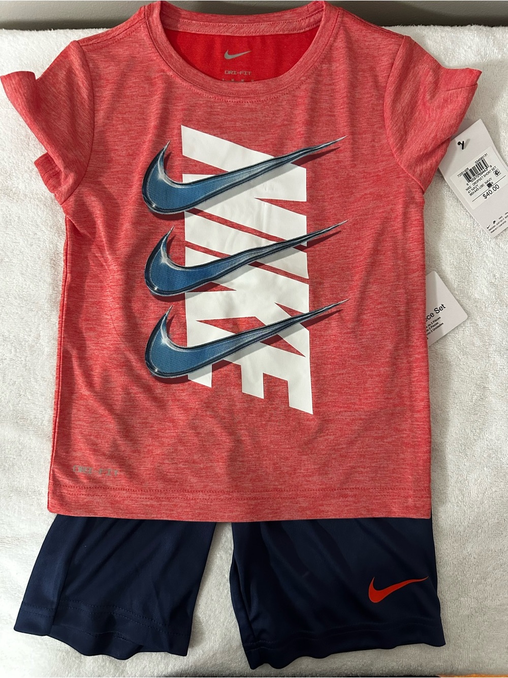 Nike Red Short Sleeve Tee with Blue Swoosh Graphic